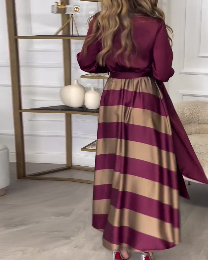 Elegantiška ilga dryžuota suknelė