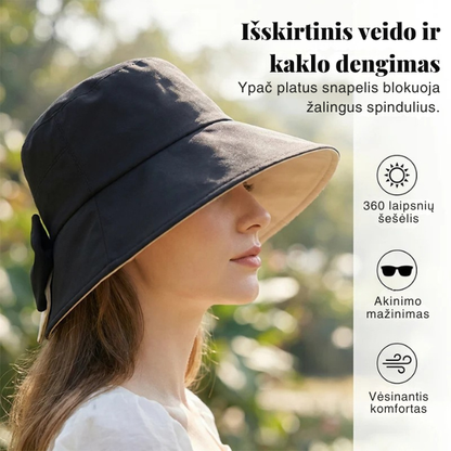 Vasariška skrybėlė plačiu kraštu ir dekoratyviniu kaspinu