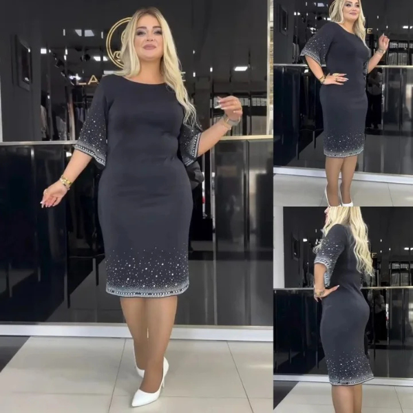 Elegantiška vidutinio ilgio suknelė su apvalia iškirpte