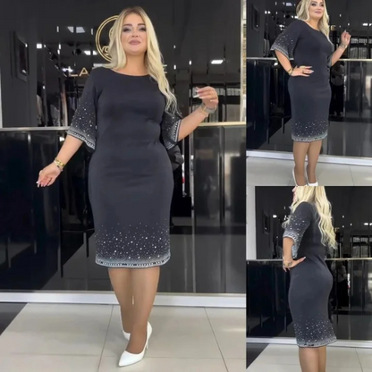 Elegantiška vidutinio ilgio suknelė su apvalia iškirpte