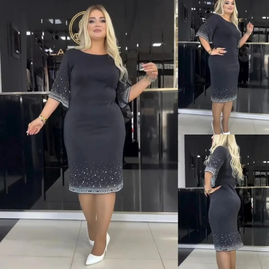 Elegantiška vidutinio ilgio suknelė su apvalia iškirpte