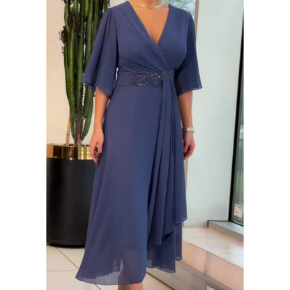 Elegantiška ilga šifoninė suknelė su V formos iškirpte