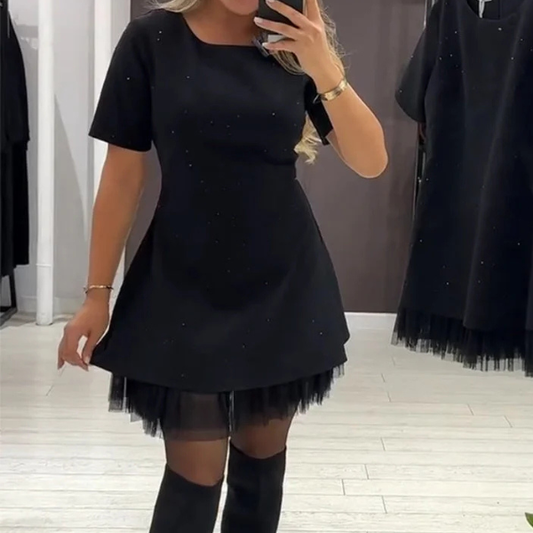 Elegantiška suknelė su žėrinčiu blizgučių raštu