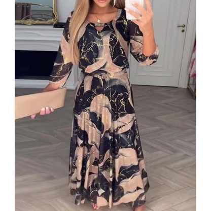 Elegantiška šifoninė suknelė su raštu ir trijų ketvirčių rankovėmis