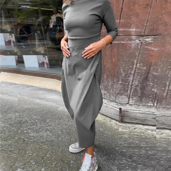 Elegantiška ilga liekninanti suknelė su kišenėmis