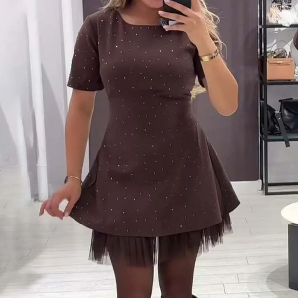 Elegantiška suknelė su žėrinčiu blizgučių raštu