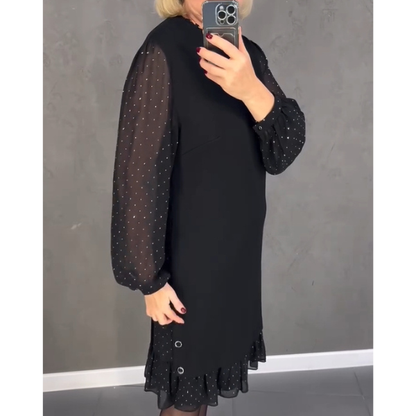 Elegantiška laisvo kirpimo suknelė su blizgiomis detalėmis