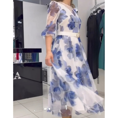 Elegantiška ir kokybiška laisvo kritimo gėlėta suknelė