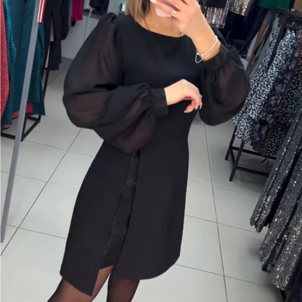 A formos suknelė su pūstomis rankovėmis ir skeltuku