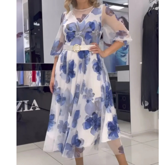 Elegantiška ir kokybiška laisvo kritimo gėlėta suknelė