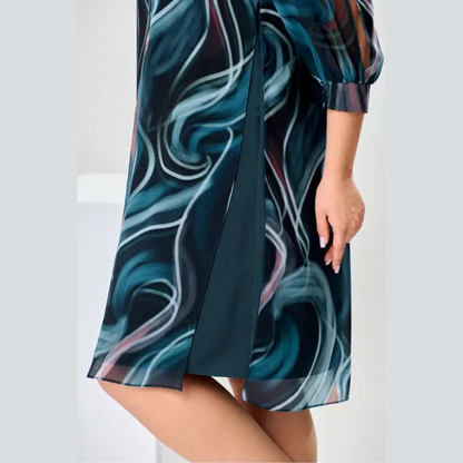Elegantiška raštuota suknelė su skeltuku