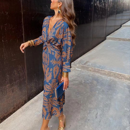 Vintažinio rašto elegantiška suknelė ilgomis rankovėmis