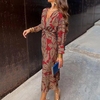 Vintažinio rašto elegantiška suknelė ilgomis rankovėmis